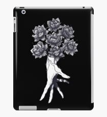Hand with lotuses on black iPad-Hülle & Klebefolie