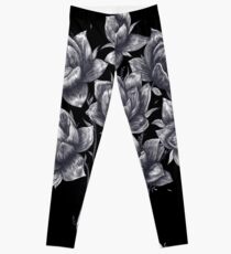 Hand with lotuses on black Leggings