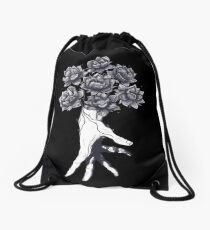 Hand with lotuses on black Drawstring Bag