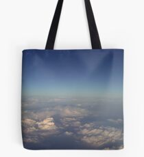 above the clouds Tote Bag