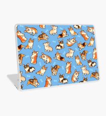 Jolly corgis in blue Laptop Skin