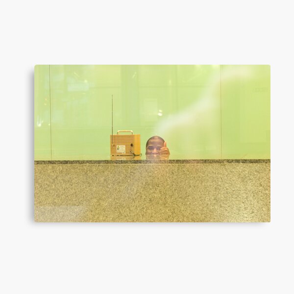 Through the window: The man behind his desk Canvas Print