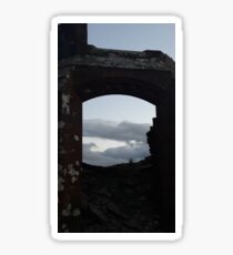 evening sky through old doorway Sticker