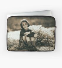 Cute girl with flowers field Laptop Sleeve