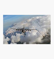An AC-130U gunship jettisons flares over Florida. Photographic Print