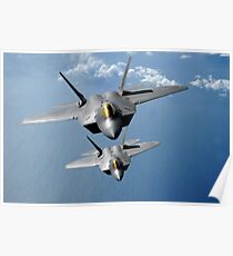 Two F-22 Raptors fly over the Pacific Ocean. Poster