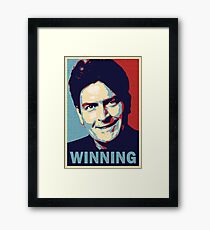Winning, by Charlie Sheen Framed Print