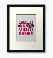 Cuddles and videogames Framed Print