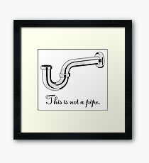 This is not a pipe. Framed Print