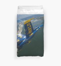 An F/A-18 Hornet of the Blue Angels over Pensacola Beach, Florida. Duvet Cover