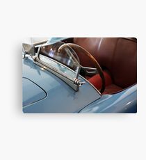 Detail of hood with windshield and steering wheel of blue car Canvas Print