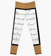 Piano keys with sheet music by Kristie Hubler Leggings