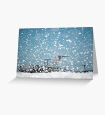A C-17 Globemaster III on the flight line as fire retardant foam is released. Greeting Card