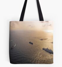 A multi-national naval force navigates the waters of the Caribbean Sea. Tote Bag