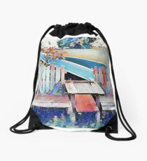 Two Heart-Shaped Chairs with Two Canoes in the Background Drawstring Bag