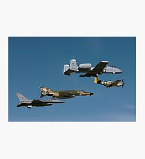 A P-51 Mustang, an F-4 Phantom, an A-10 Thunderbolt and an F-16 Fighting Falcon in a heritage flight. Photographic Print