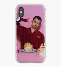 Joe Jonas pouring syrup over some pancakes iPhone Case