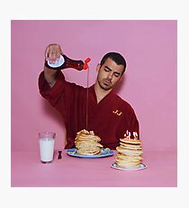 Joe Jonas pouring syrup over some pancakes SQUARE! Photographic Print