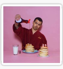 Joe Jonas pouring syrup over some pancakes SQUARE! Sticker
