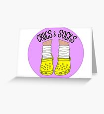 Tarjeta de felicitación Crocs y calcetines