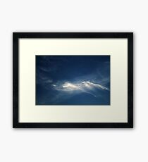 White mountains in the sky Framed Print