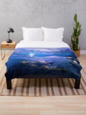 above the clouds Throw Blanket