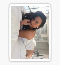 Demi Lovato laying in bed Sticker