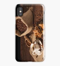Coffee cup with cinnamon, star anise and dried orange fruit iPhone Case