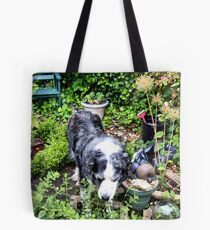 Duke smelling the Lemon Balm Tote Bag