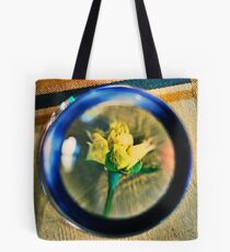 Examining a Captive Heart Tote Bag