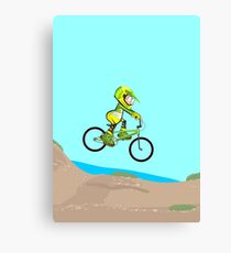 Boy on his BMX bike jumping to dirt track Canvas Print