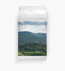 Afternoon light over church Duvet Cover