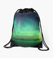 Northern lights over lake Drawstring Bag