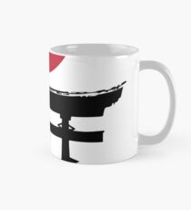The rising sun over a Torii gate Mug