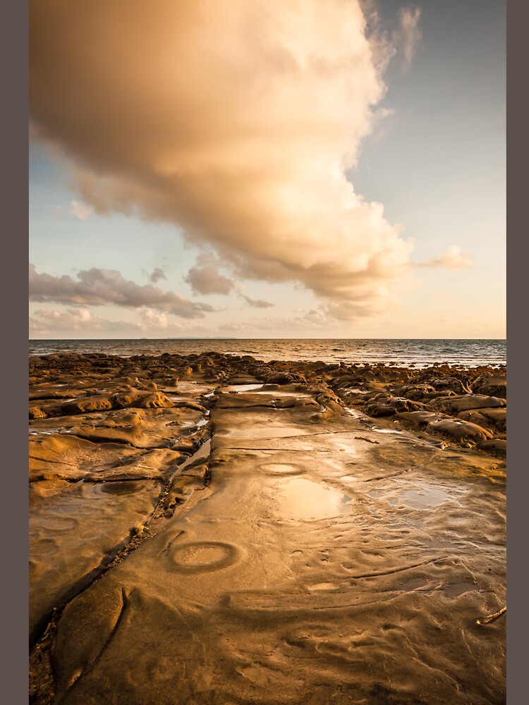 Rocky beach at tip of Borneo by Juhku
