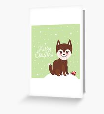 Merry Christmas New Year's card design funny brown husky dog, Kawaii face with large eyes and pink cheeks, light green background Greeting Card