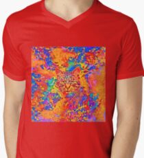 A colorful dramatic Cat is sitting on a colorful quilt V-Neck T-Shirt