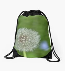 One dandelion growing in the woods Drawstring Bag