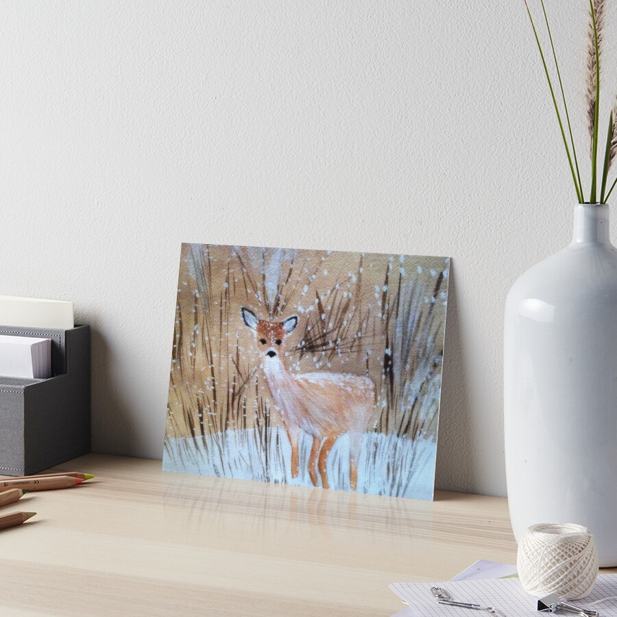 Deer in the Snow Art Board Print