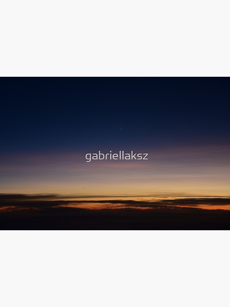 Moon rising above the clouds; sunset above clouds; sunset; moon by gabriellaksz