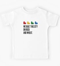 Camiseta para niños CONSTRUIMOS ESTA CIUDAD EN ROCK AND WHEAT Colonos de Catan