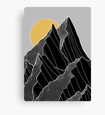 The dark peaks under the golden sun Canvas Print