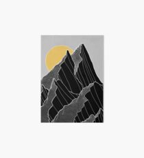 The dark peaks under the golden sun Art Board