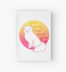 Cuaderno de tapa dura "No te rindas" alentando al zorro ártico