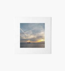 View of the Sea Bay with a Ship just before Sunset Art Board