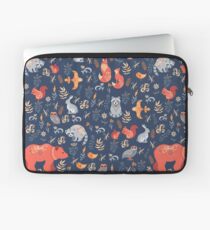 Fairy-tale forest. Fox, bear, raccoon, owls, rabbits, flowers and herbs on a blue background. Laptop Sleeve