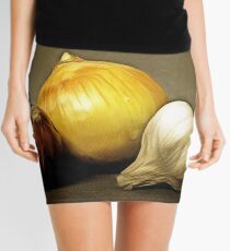 Still leben with red and yellow onion and a Garlic on brown backdrop Mini Skirt