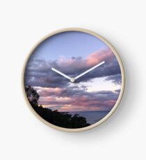 Purple pink clouds during sun set, Wollongong, NSW, Australia Clock