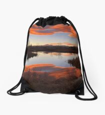 Pink cloud sunset over still lake Drawstring Bag