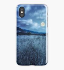 meadow with high grass in mountains at night iPhone Case